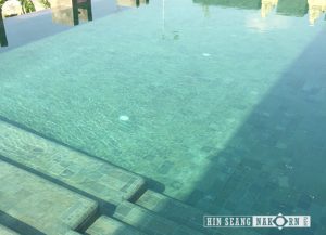 Green sukabumi swimming pool tiles installed in residential villa 