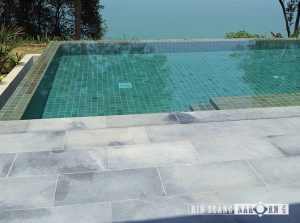 Green sukabumi sawn for pool tiles combine with sky blue for pool terrace 