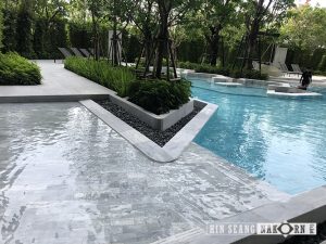 Tribeca swimming pool tiles and pool coping