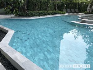 light grey tribeca pool tiles in swimming pool 