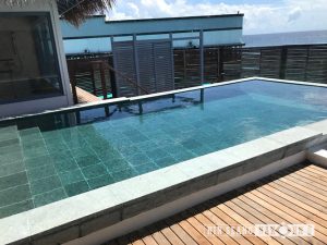 Green sukabumi for swimming pool tiles in pool villa at Maldives 5 stars hotel